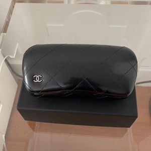 - Chanel black case